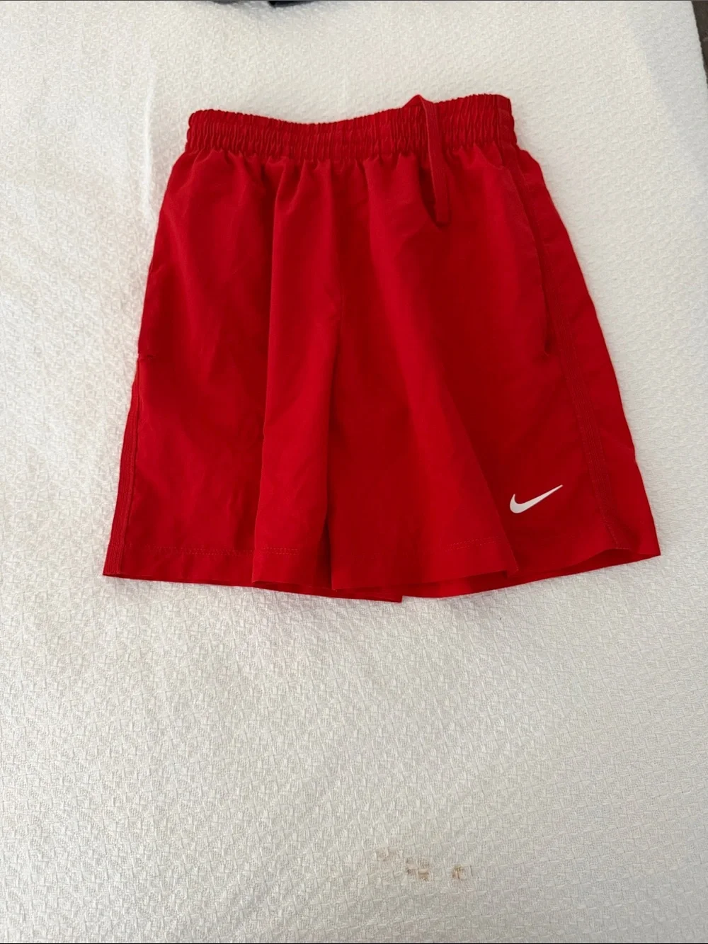 Nike Kids Red Athletic Shorts with White Swoosh